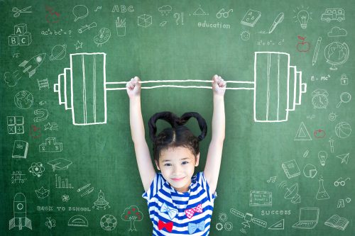 Strong,Kid,With,Weight,Lifting,Doodle,On,School,Chalkboard,For